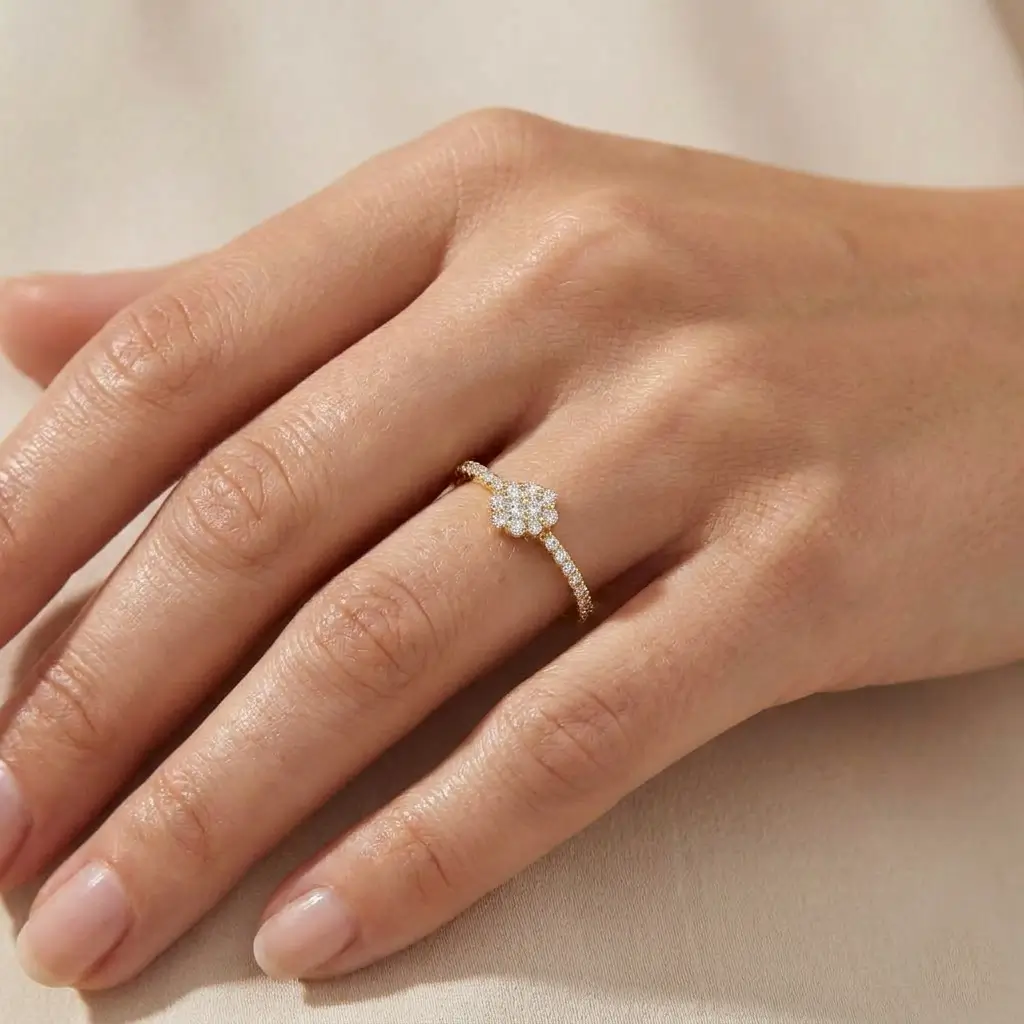 Blooma Ring in yellow gold with a floral diamond cluster and pavé diamond band