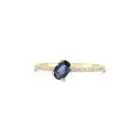 Blue Grace Ring in yellow gold with an oval blue sapphire and pavé diamond band