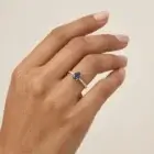 Blue Grace Ring in yellow gold with an oval blue sapphire and pavé diamond band