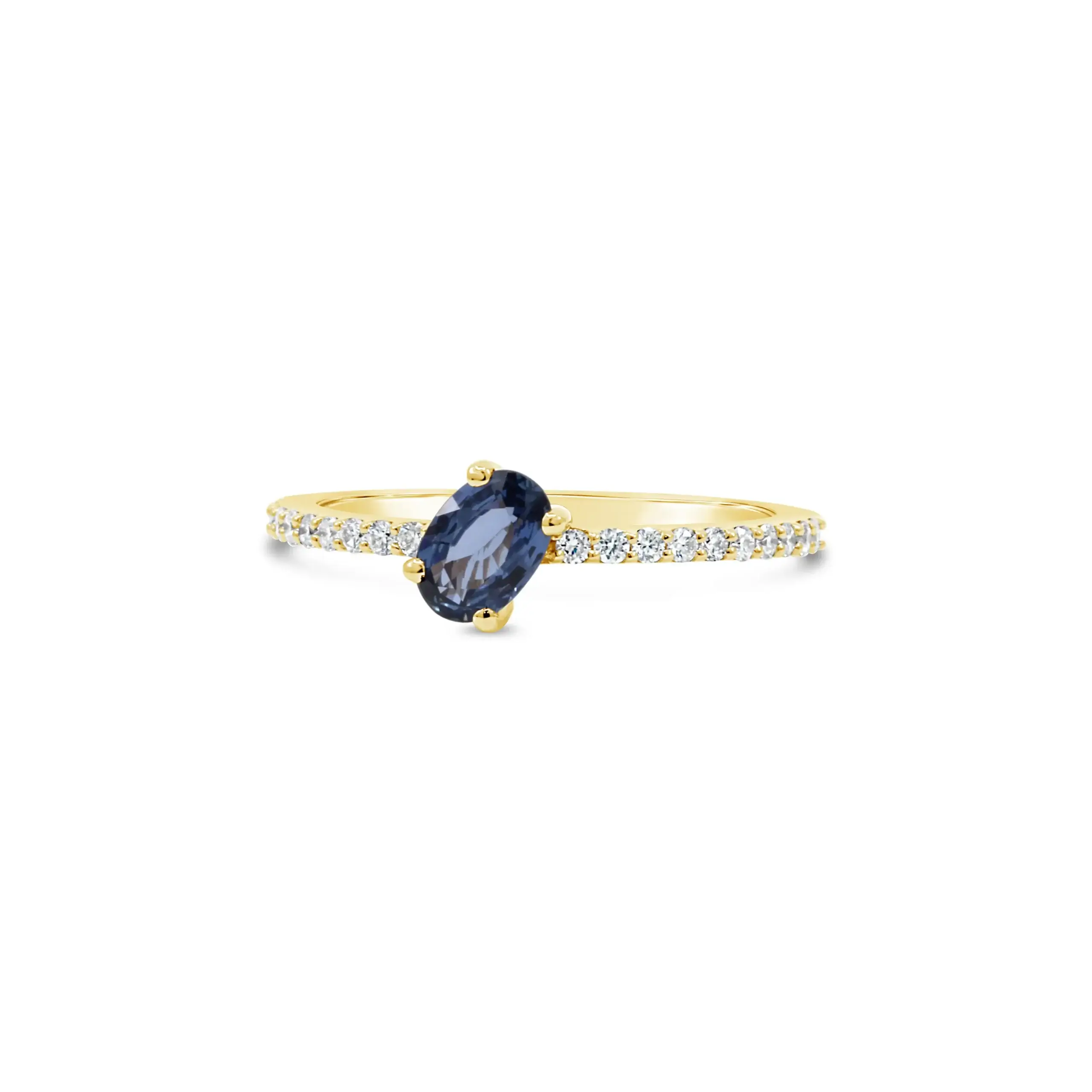 blue-grace-sapphire-ring-yellow-gold Blue Grace Ring in yellow gold with an oval blue sapphire and pavé diamond band