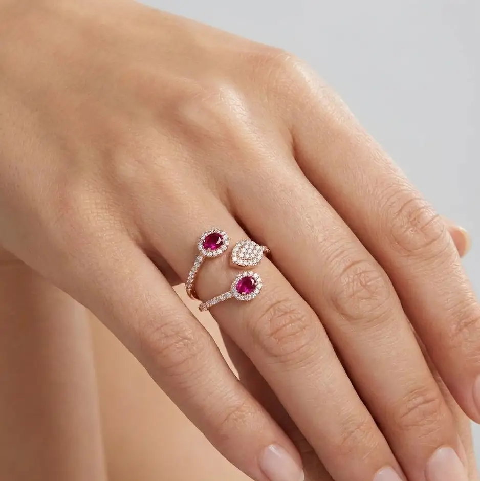 Cui Ring in pink gold with oval rubies and diamond halo details