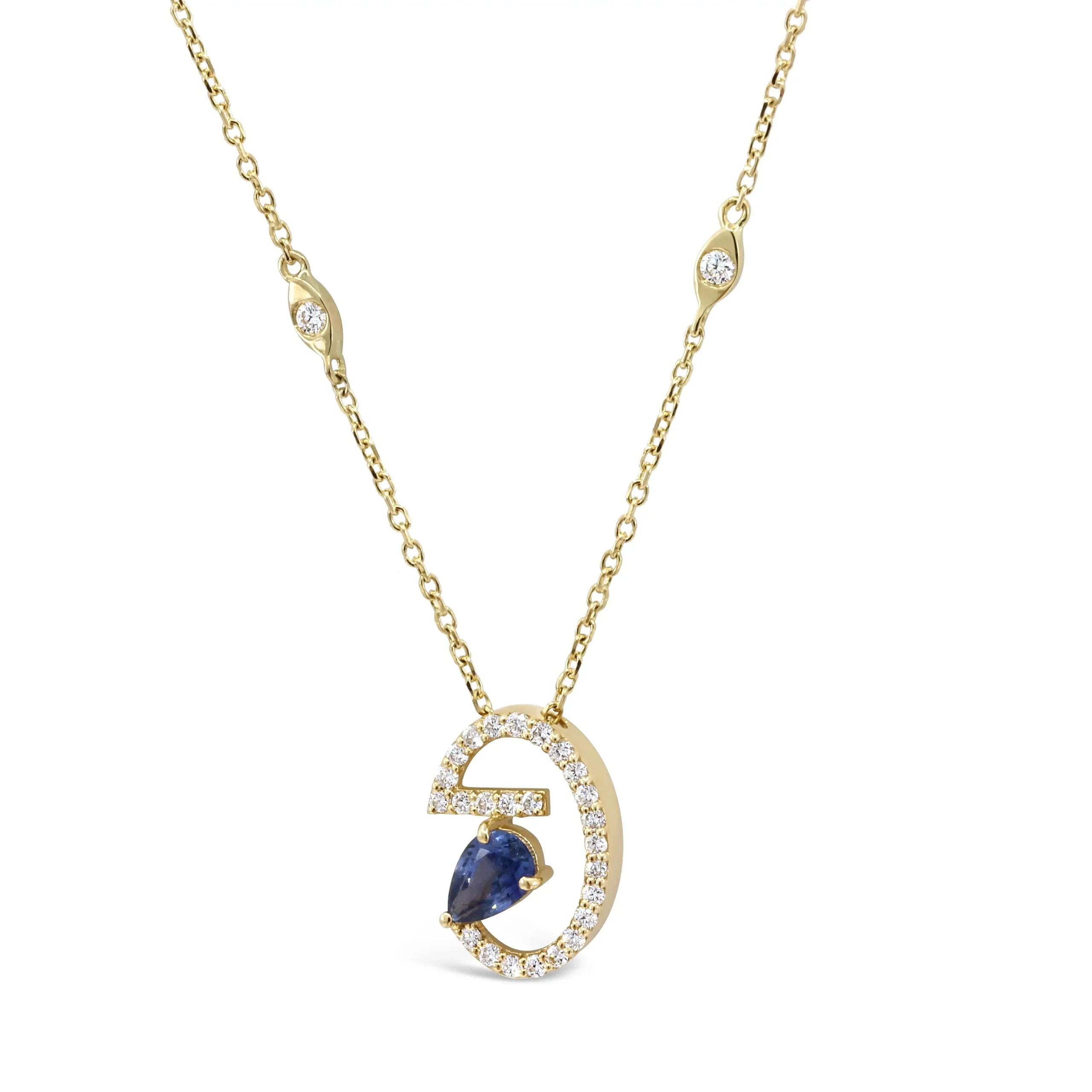 flipped-pendant-blue-sapphire-diamond-pendant-necklace Flipped Pendant blue sapphire diamond pendant necklace in yellow gold with pear-shaped blue sapphire
