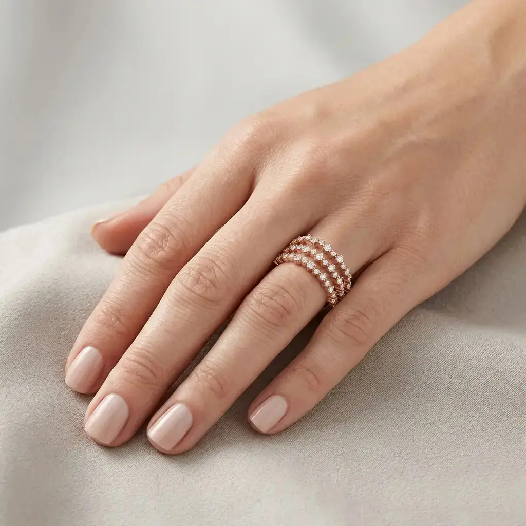 Gade Ring in pink gold with three rows of pavé diamonds