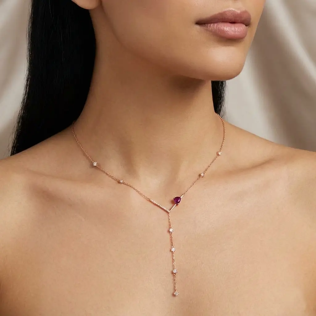 Liora Drop Necklace in pink gold with a heart-shaped ruby and diamond drop details