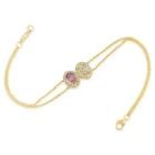 Lunelle Bracelet in yellow gold with a pink sapphire and diamond halo details