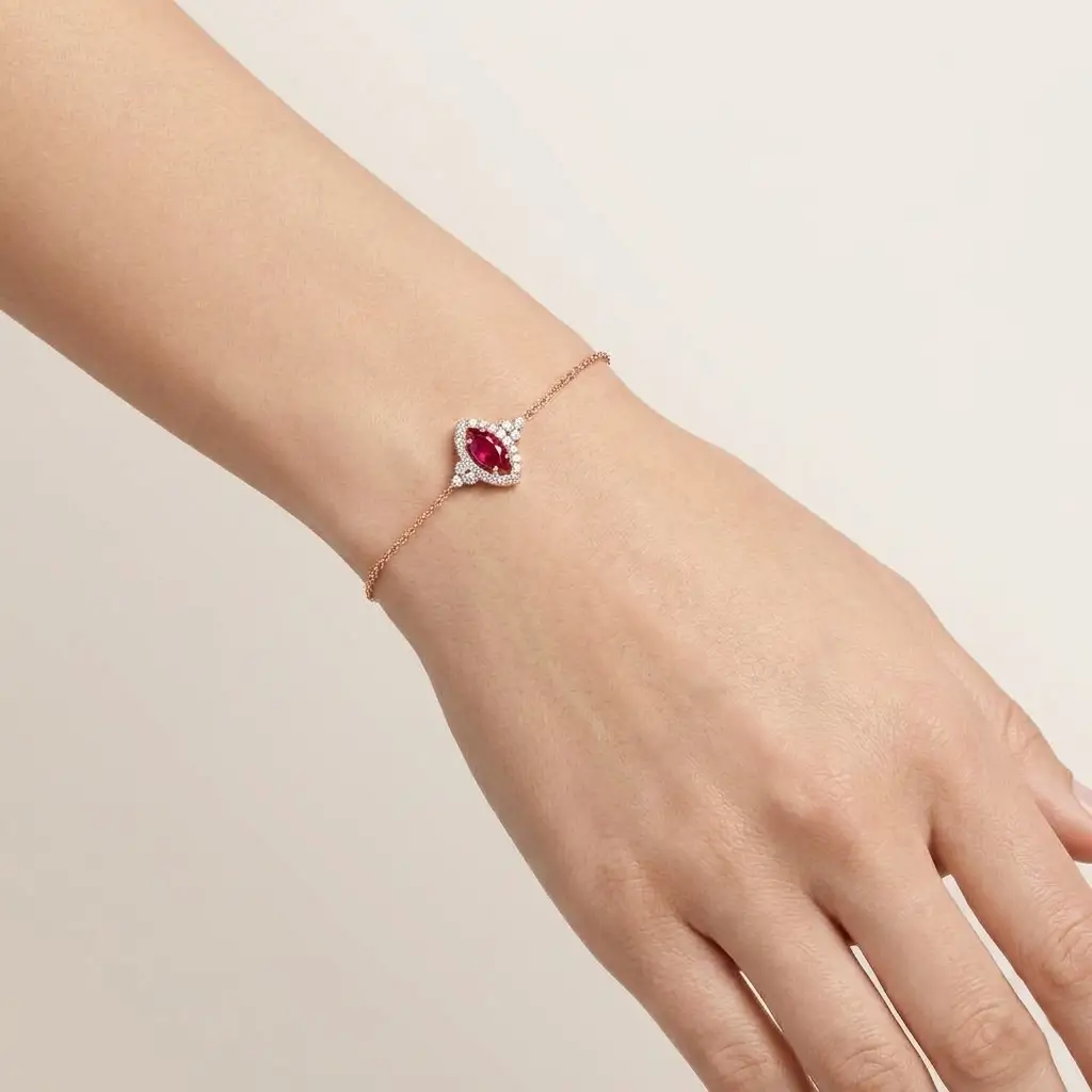 Marquise Ruby Bracelet in pink gold with a marquise ruby and diamond halo