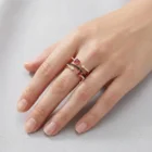 Nelio Ring in pink gold with rubies, black diamonds, and white diamonds