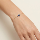 Safira Bracelet in pink gold with a marquise sapphire and diamond halo