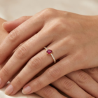 Velina Ring in yellow gold with a pear-shaped ruby and pavé diamond band