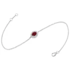 Veloura Bracelet in white gold with an oval ruby and diamond halo