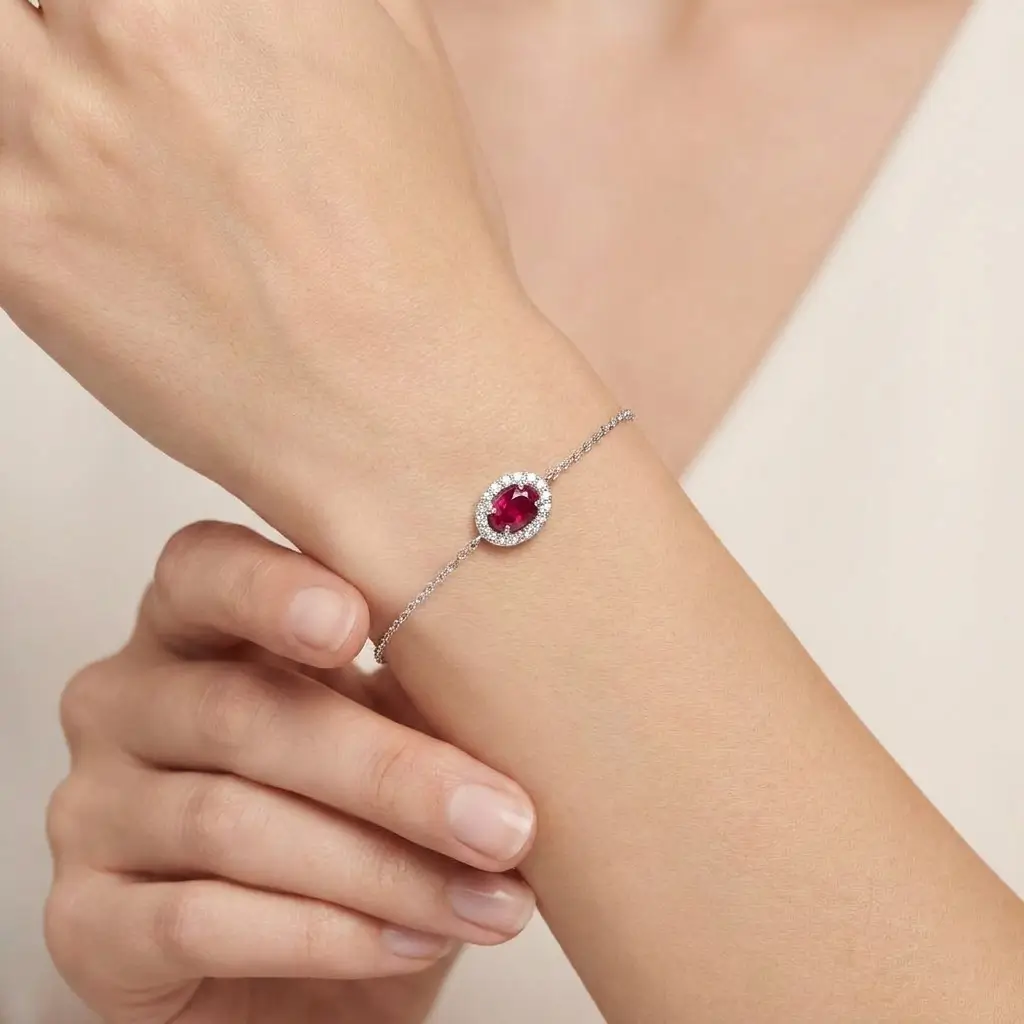 Veloura Bracelet in white gold with an oval ruby and diamond halo