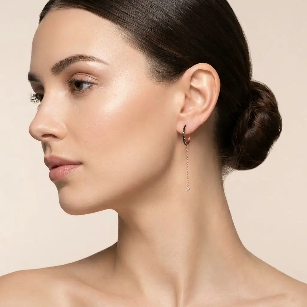 Yena Earrings in pink gold with black diamonds and a delicate drop chain