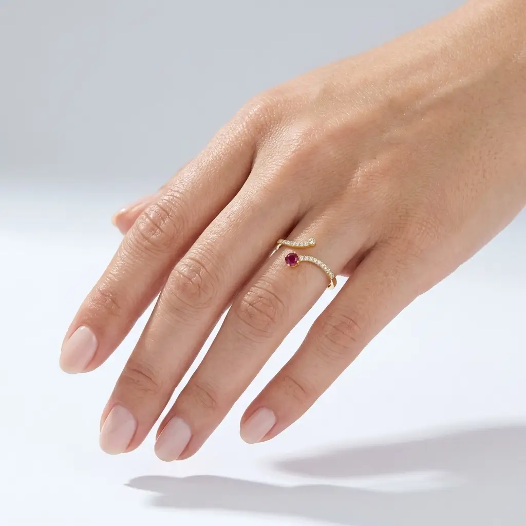 Rubbly Ring in yellow gold with a round ruby cabochon and diamond accents