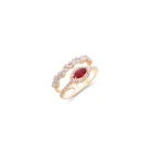 Eclipse Ruby Ring in pink gold with a marquise ruby, diamond halo, and diamond band