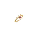 Ruby Twist Ring in yellow gold with a vivid oval ruby and delicate diamond accents